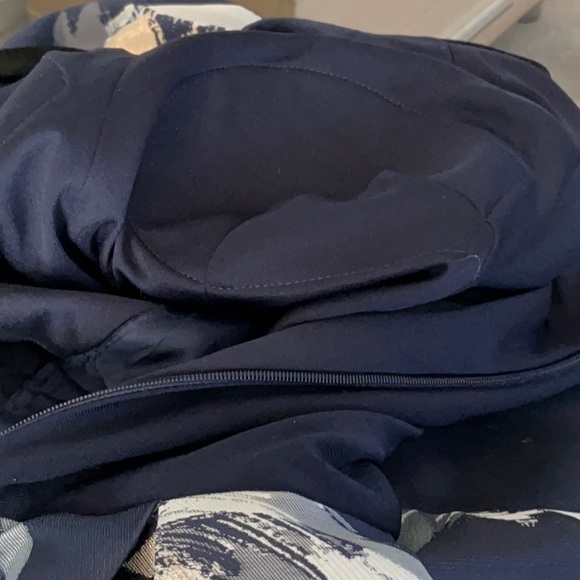 Elegant Navy Cross-Back Top with Floral Skirt - Picture 13 of 13